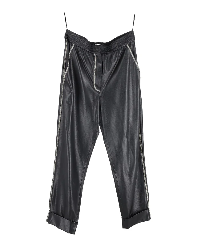 Nanushka Elastic-Waist Trousers in Black Faux Leather